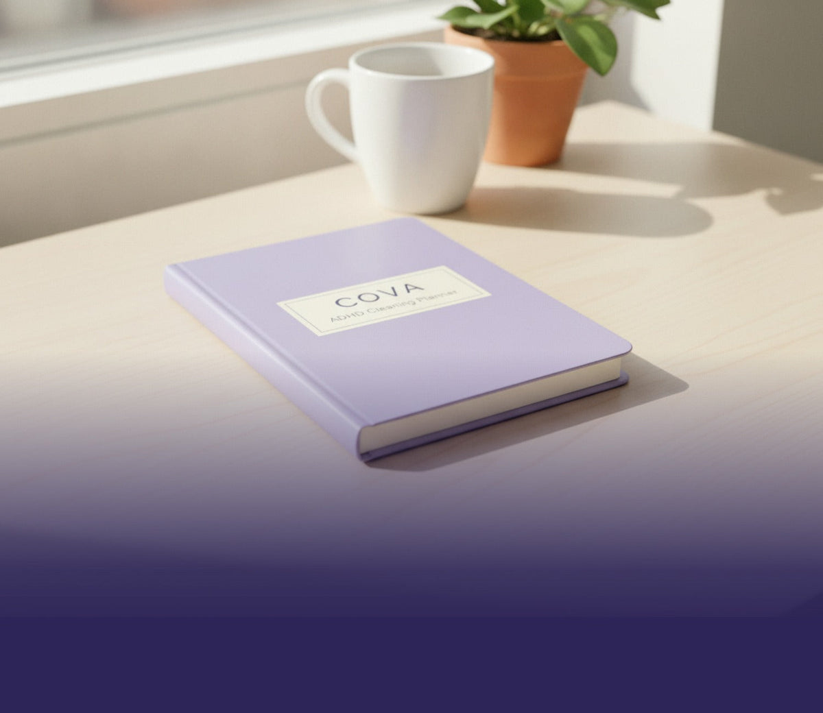The COVA ADHD Cleaning Planner on a desk with a mug and a plant