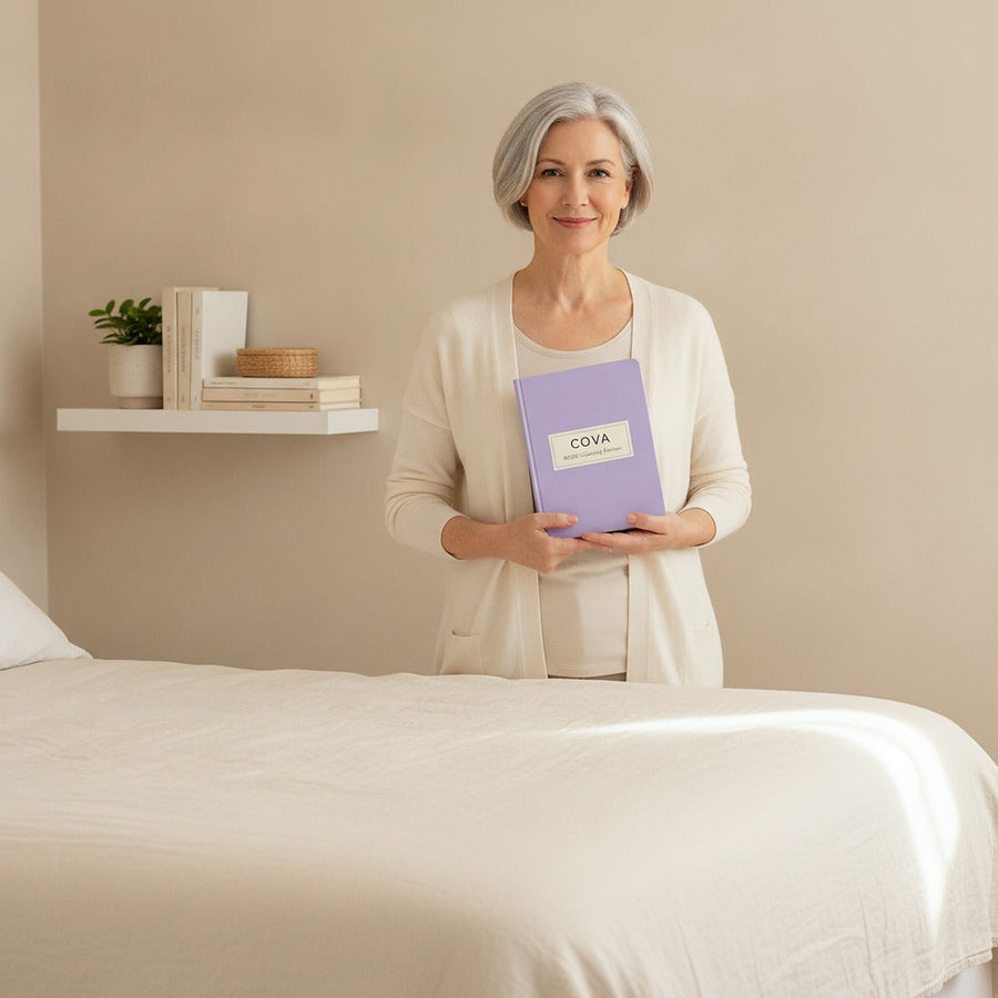 A woman in a tidy bedroom holding the planner