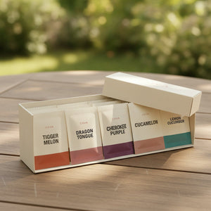 The open COVA seed box with ten packets standing in a row