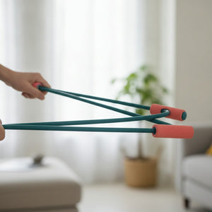 Hands stretching the teal latex tubes of the COVA band