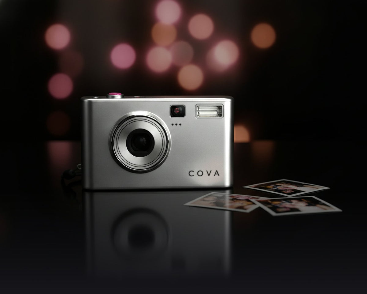 The COVA camera on a dark table with pink party lights behind it